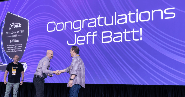 Jeff Batt receiving his Guild Master award at DevLearn 2025